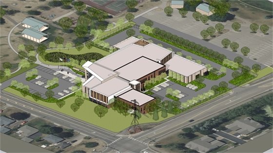 aerial rendering of a building with section of purple and yellow to distinguish different areas with a parking lot