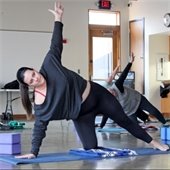 woman doing a yoga stretch