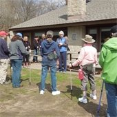 Instructor and students with Nordic walking poles