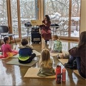 Librarian reads to kids