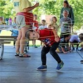 child dodges yarn lasers