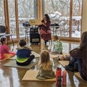 Librarian reads to kids
