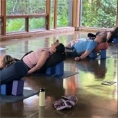 Students practice yoga